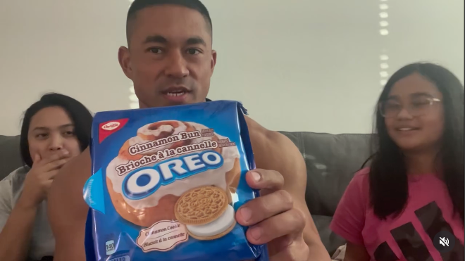 Customer holding Oreo Cinnamon Bun cookies in an Instagram Reel